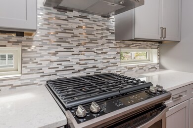 Slide in range with hood