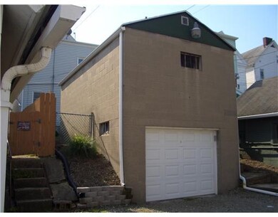 Exterior Front. Single car garage w/off street par