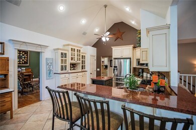 Large kitchen with tons of cabinet space and gas range