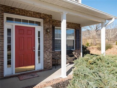 Covered front porch to enjoy the neighborhood