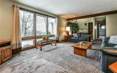 You enter the front door of the home into an ample