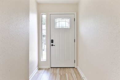 Beautiful front entry with new flooring.