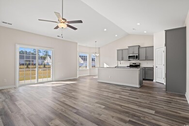 Unfurnished living room with dark hardwood / wood-