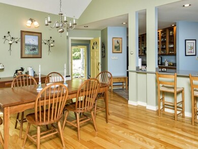 Dining room open to living room with...
