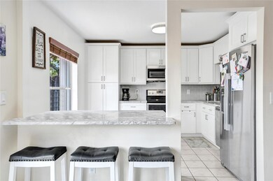 KITCHEN WHEN IT WAS REMODLED THE WALL WAS TAKEN OU