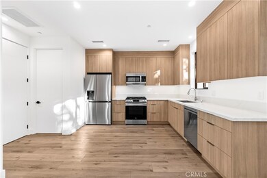 View to Kitchen from Living/Family Room