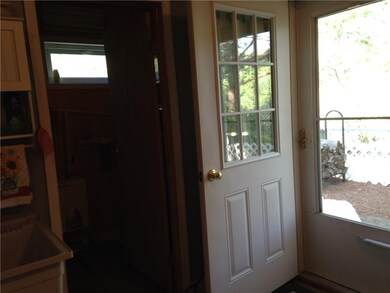Notice the screen door and main door leading into 