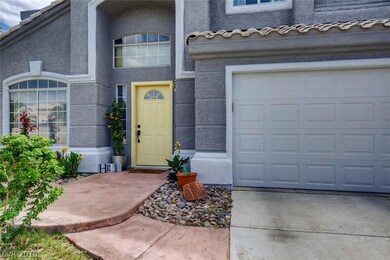 Cheery yellow door greets you when you come home e