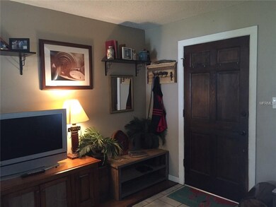 Livingroom: tile foyer, wood laminate flooring, so