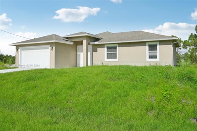 1016 Genoa Ave S, Lehigh Acres, FL 33974 - photo 3