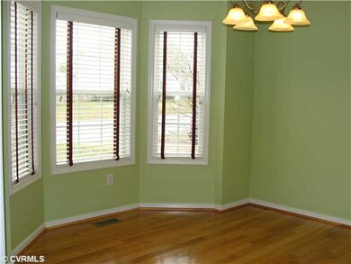 Dining Room - The Formal Dining Room has hardwood 