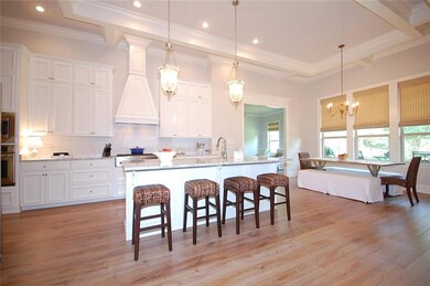 Designer Lighting and Pecan Hardwood Flooring