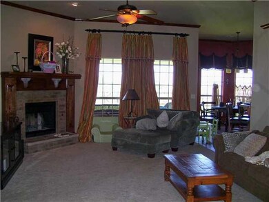 Living Room. Corner fireplace  in this large l and comfortable family room