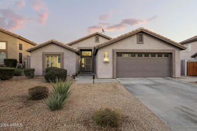 Front of home at sunset