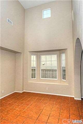 Formal Dining Room with dramatic two story ceiling