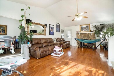 Living room featuring hardwood / wood-style floori