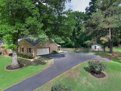 Nice paved driveway with parking and turn around space.