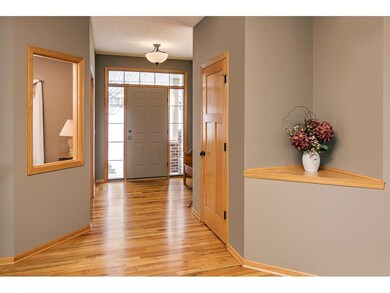 Bright entry has a convenient coat closet and hard