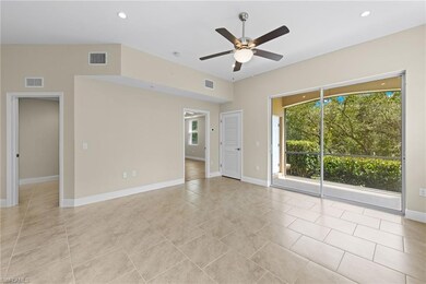 Living Room looking out to Private Lanai and into 