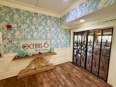 Interior space with hardwood / wood-style flooring
