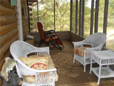 Patio/Deck. Another relaxing place to enjoy ! A large breezy screened in porch !