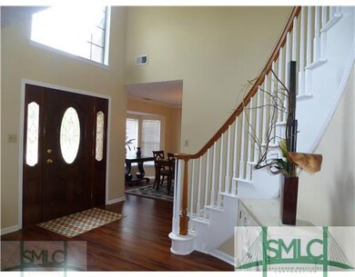 Foyer. Spacious Grand 2 Story Foyer Open To Dining
