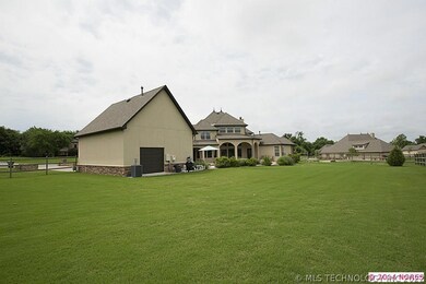 Rear view reveals massive 3/4 acre lot and pull-th