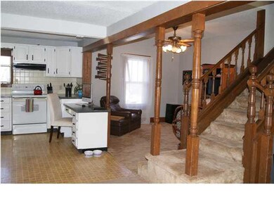 Beautiful Staircase from kitchen leading to 2nd St
