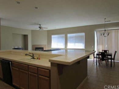 kitchen eating area and bar looking into great roo
