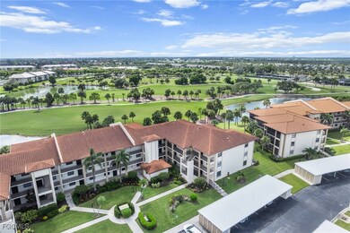 Aerial view of a golf course and a large body of water