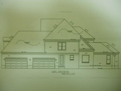 Right Elevation. 4 car garage!