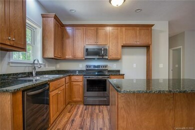 Granite with gun metal appliances