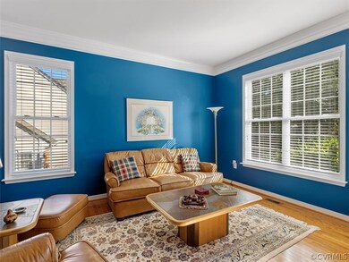 hardwoods, crown molding, large window with natural light
