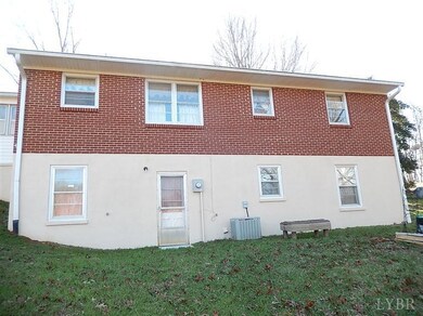 Rear of home showing walkout basement door