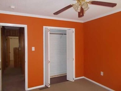 Bathroom. Master bed has ceiling fan and decorator