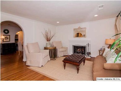 Cozy sitting area with fireplace and recessed ligh