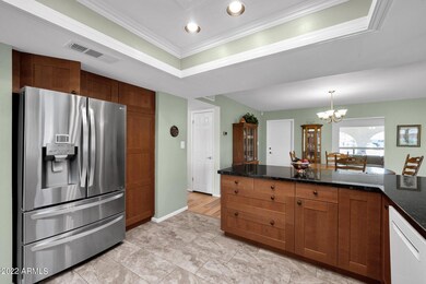 Kitchen opens to Dining Living Family Rm