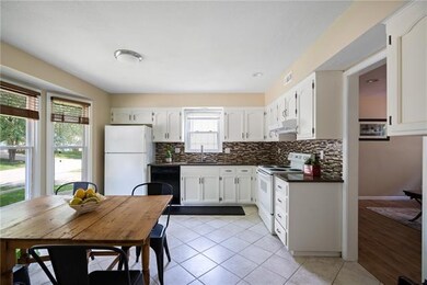 Updated kitchen with tiled floors.