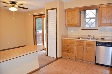 Ceramic floor and stainless appliances