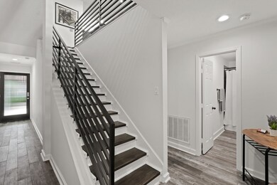 Back Entrance Hallway with Tile Floors and Entire