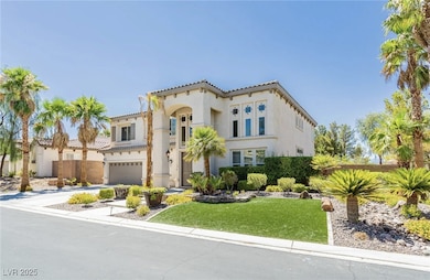 Mediterranean / spanish home with a tile roof, a f