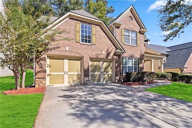 View of front of property with concrete driveway, 