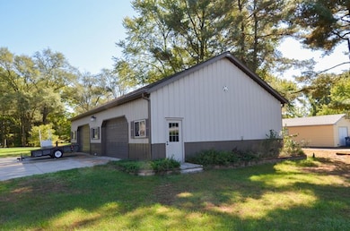 heated building with 400 amp electrical, 3 garage 
