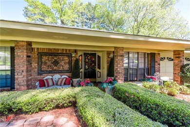 Inviting curb appeal with charming front porch.