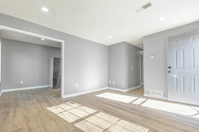 Unfurnished room featuring light hardwood / wood-s