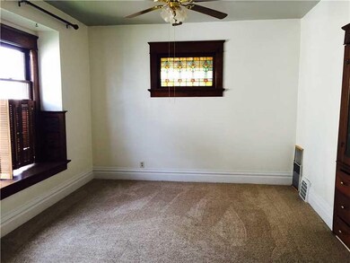 Dining Room. stained glass window and built in chi
