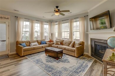 Two banks of triple windows let in an abundance of natural light.