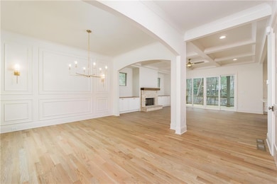 Unfurnished living room with light wood-type floor