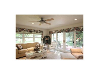 Sun Room. Three walls of windows encompass this aw