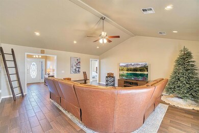 Living room with dark hardwood / wood-style floors